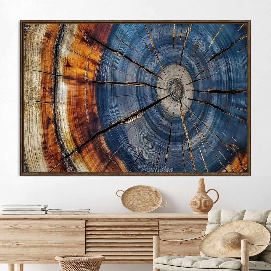 Close-up of blue, brown, and orange wood grain rings on the Abstract Tree Rings Canvas Wall Art Print.