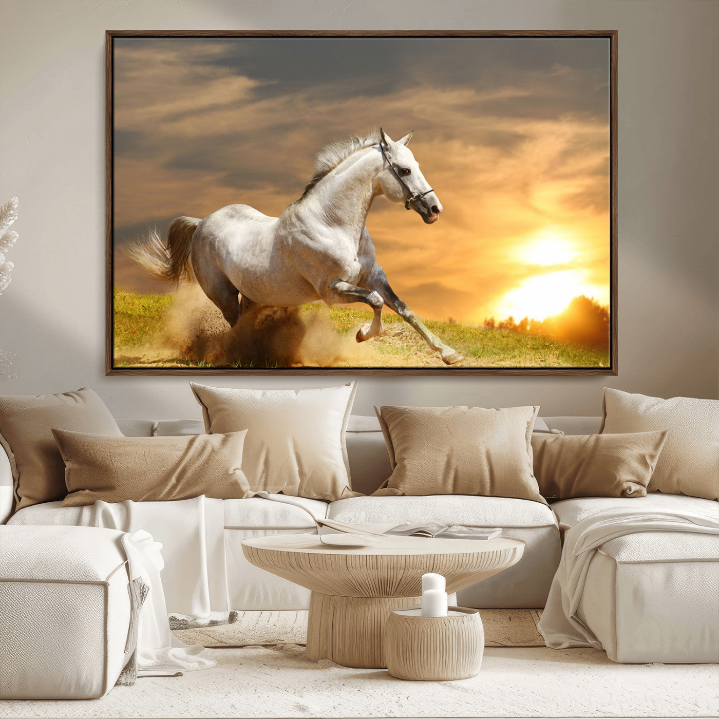 A powerful white horse galloping through the field at sunset, with the golden light illuminating its mane and the vibrant sky in the background.