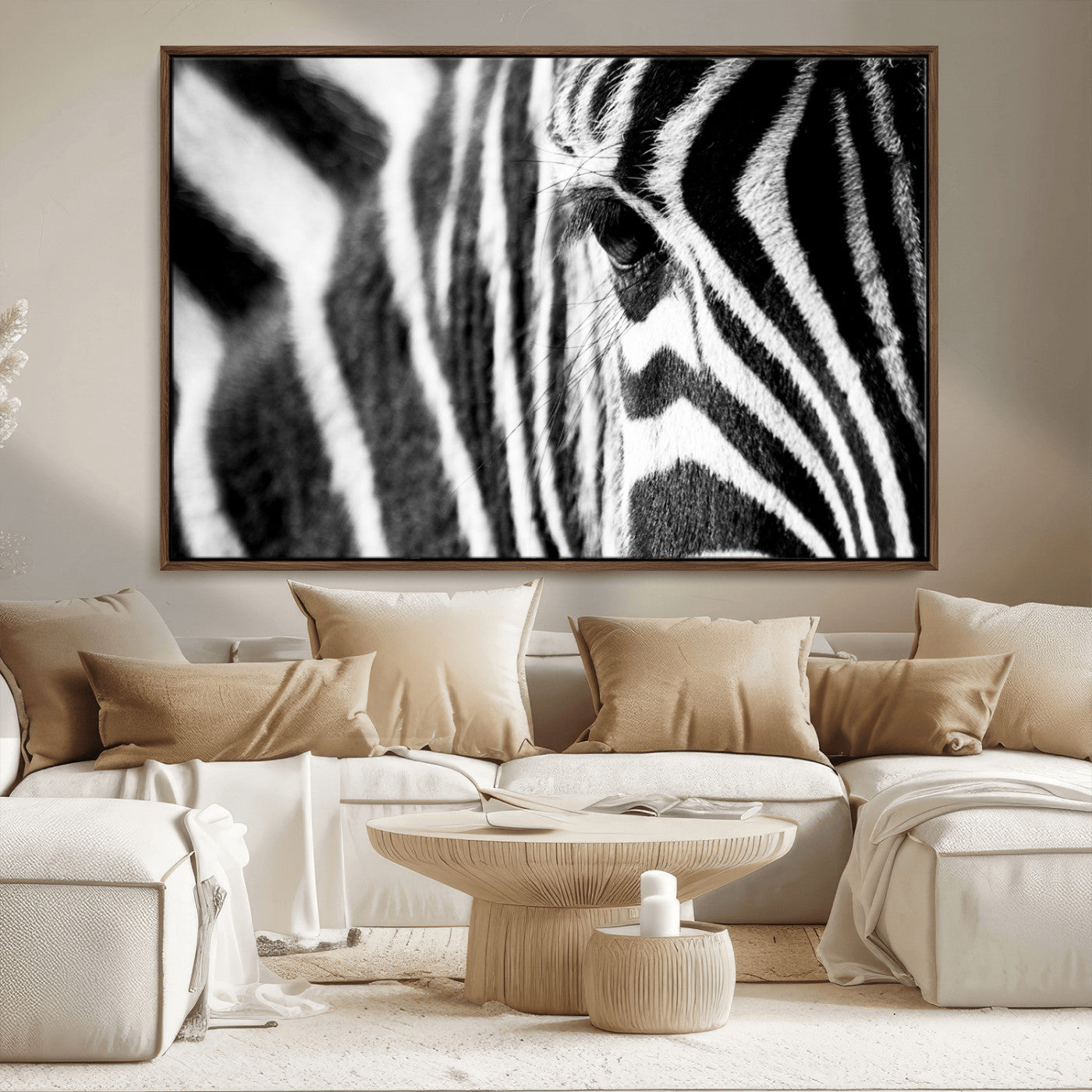 A close-up black and white photograph of a zebra's eye, showcasing the intricate patterns of its stripes in sharp detail.