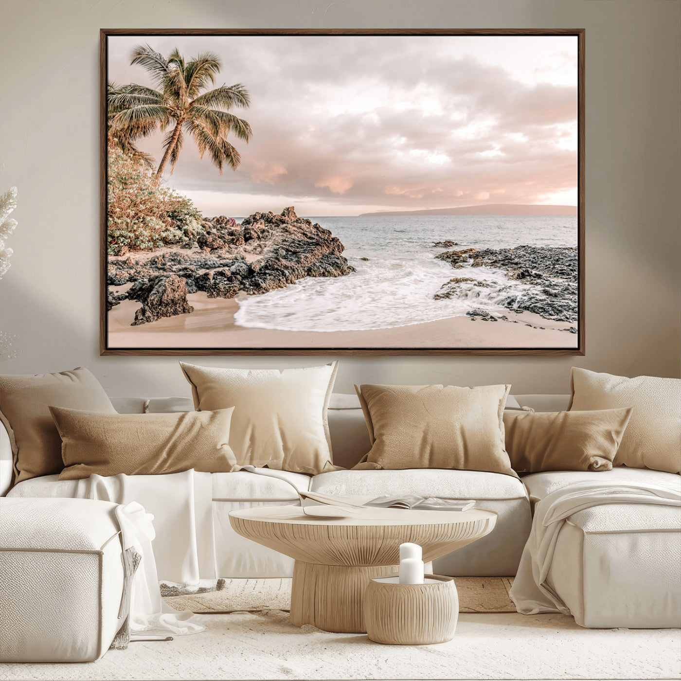 A peaceful beach scene with a palm tree and rocks, soft waves washing onto the shore under a soft pastel sky at sunset.