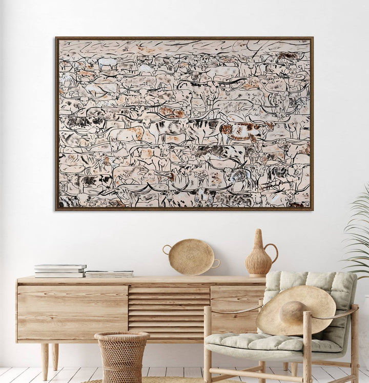 The dining room features a rustic decor highlighted by the Cattle Herd Wall Art.