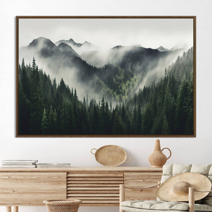 The Misty Forest Canvas Print Wall Art captures a serene misty forest scene with fog and mountains.