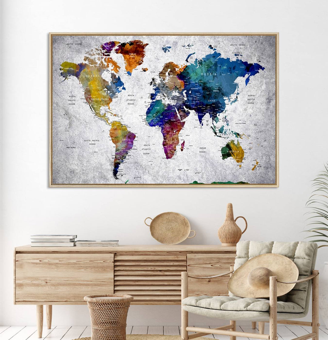 The World Map Art Canvas Print, featuring country names on a grunge-stained gray background, is perfect for stylish home decor.