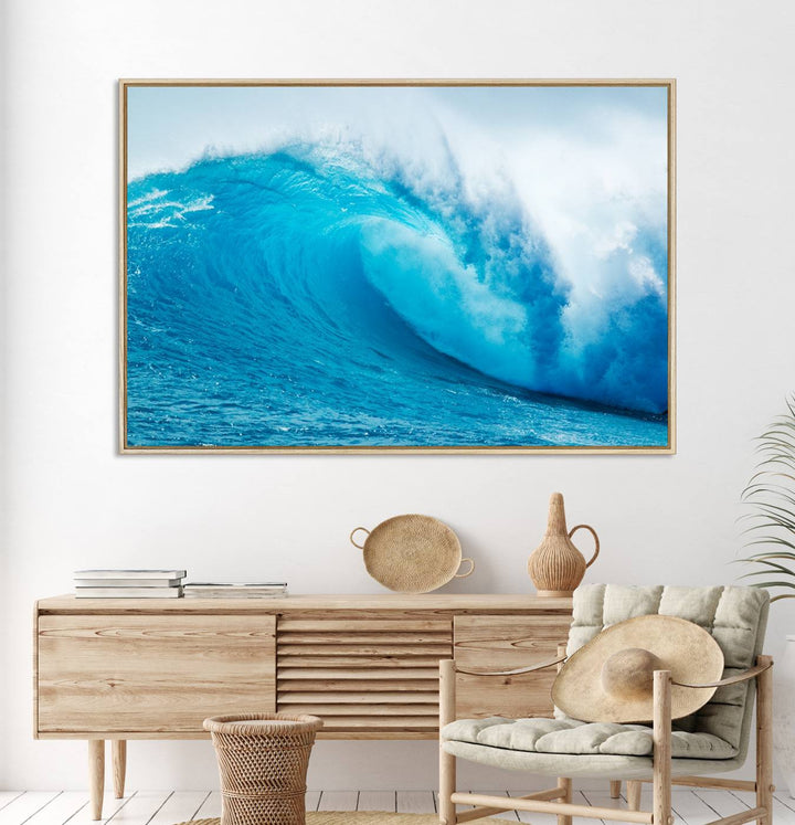 A museum-quality canvas depicting a vibrant blue ocean wave with white foam under a clear sky.