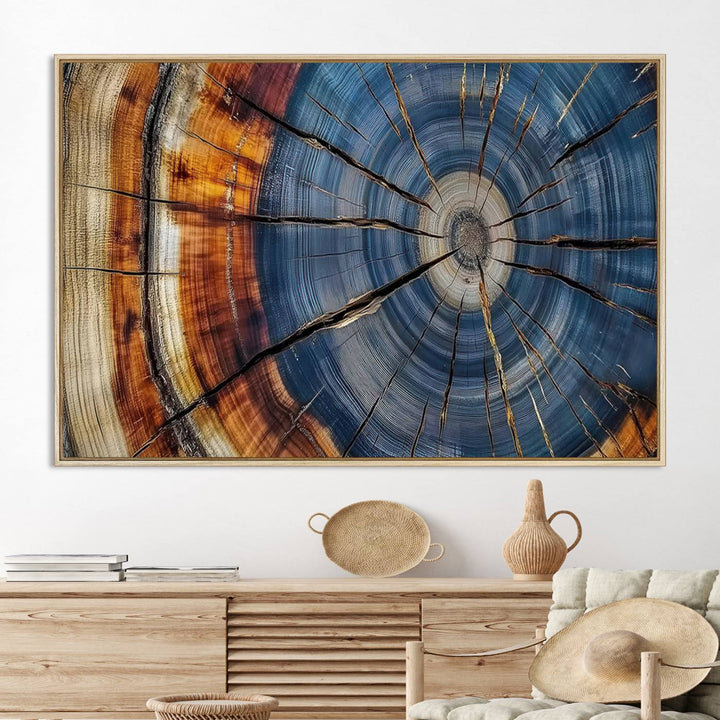 Close-up of blue, brown, and orange wood grain rings on the Abstract Tree Rings Canvas Wall Art Print.