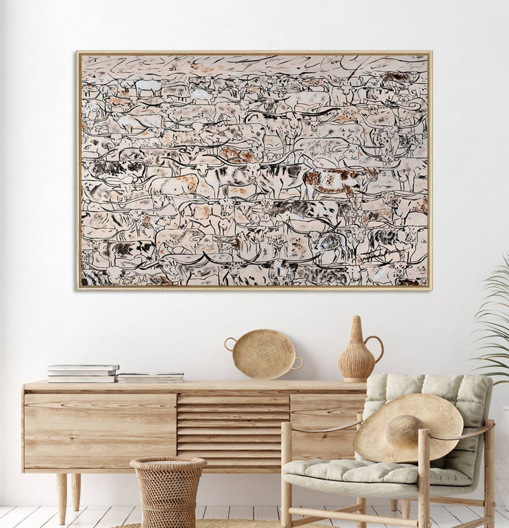 The dining room features a rustic decor highlighted by the Cattle Herd Wall Art.