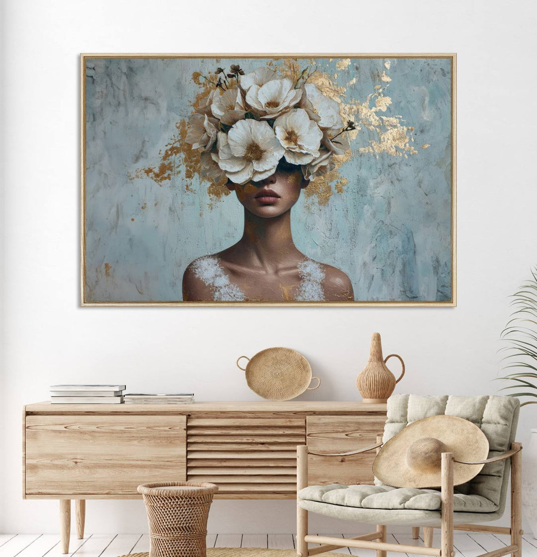 Golden Petal Wall Art: A womans face adorned with a gold floral design on a teal background, presented in a 3-panel modern glam canvas.