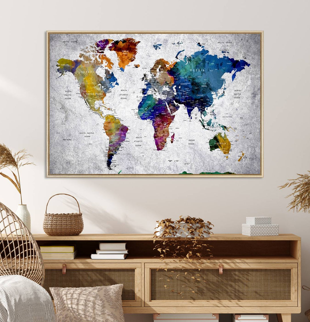 The World Map Art Canvas Print, featuring country names on a grunge-stained gray background, is perfect for stylish home decor.