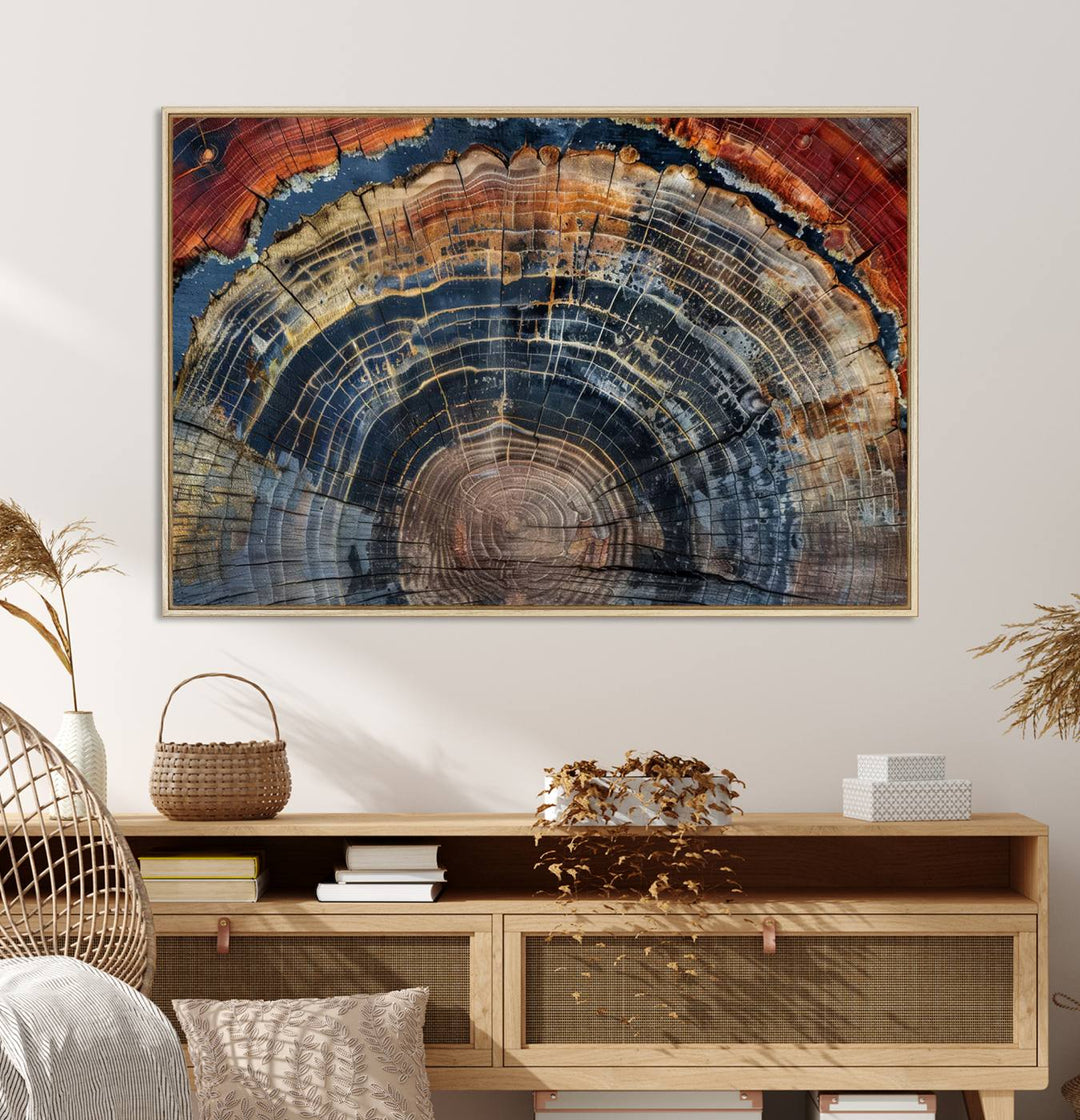 The Abstract Tree Ring Wall Art in orange, blue, and gray perfectly complements minimalist nature-inspired home decor.