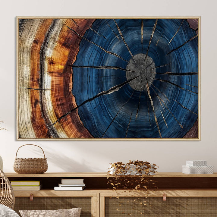 The Abstract Tree Rings Canvas Print features blue, brown, and orange rings that highlight wood grain and natures beauty.