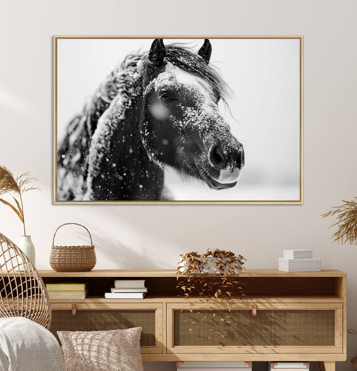 A large 3-panel rustic farmhouse wall art showcases a black and white winter horse canvas print against a snowy backdrop.