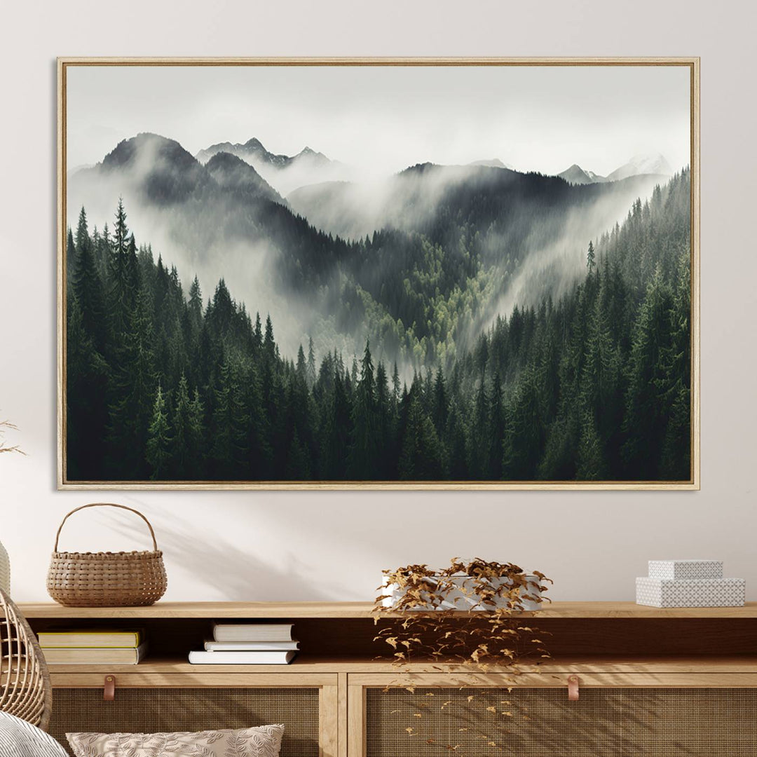 The Misty Forest Canvas Print Wall Art captures a serene misty forest scene with fog and mountains.