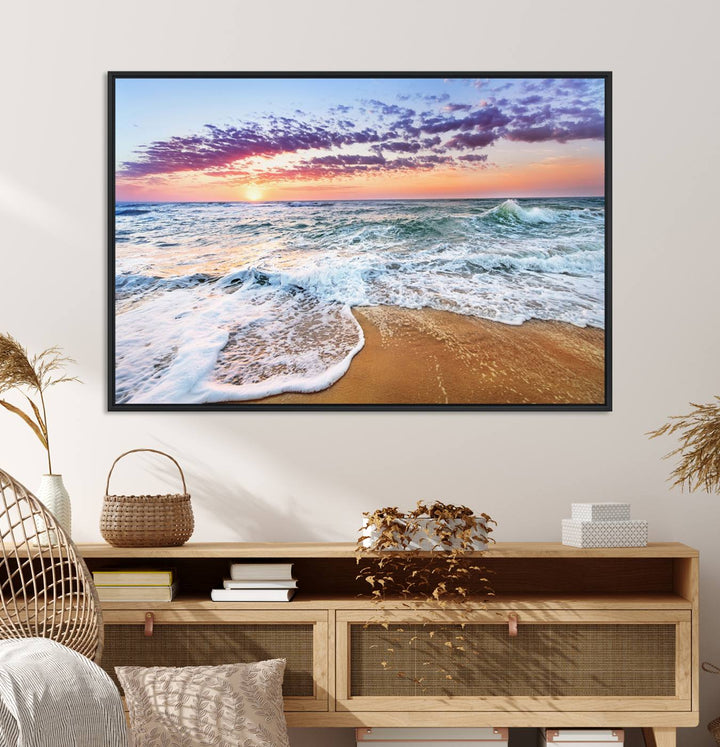 The Coastal Sunset Art Canvas Print features ocean waves beneath a vibrant sky in a stunning 3-panel seascape.