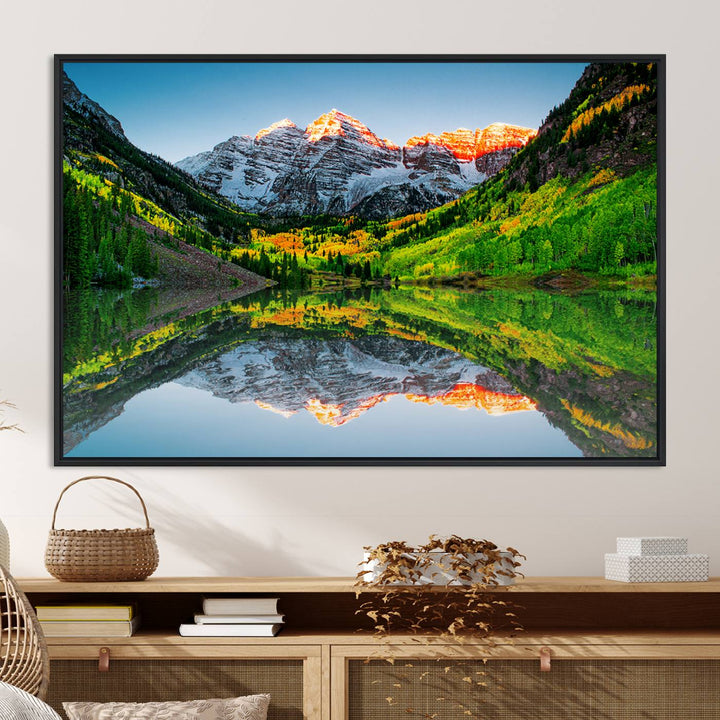 The Sunrise Maroon Bells Lake Wall Art Print beautifully captures North Maroon Peak mirrored in the tranquil lake, framed by lush greenery.