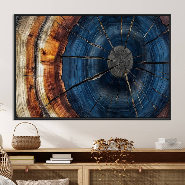 The Abstract Tree Rings Canvas Print features blue, brown, and orange rings that highlight wood grain and natures beauty.