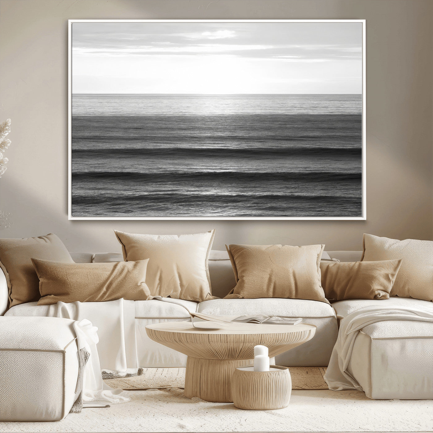 Minimalist black and white ocean view with layered waves reflecting sunlight, evoking a sense of calm and coastal serenity.