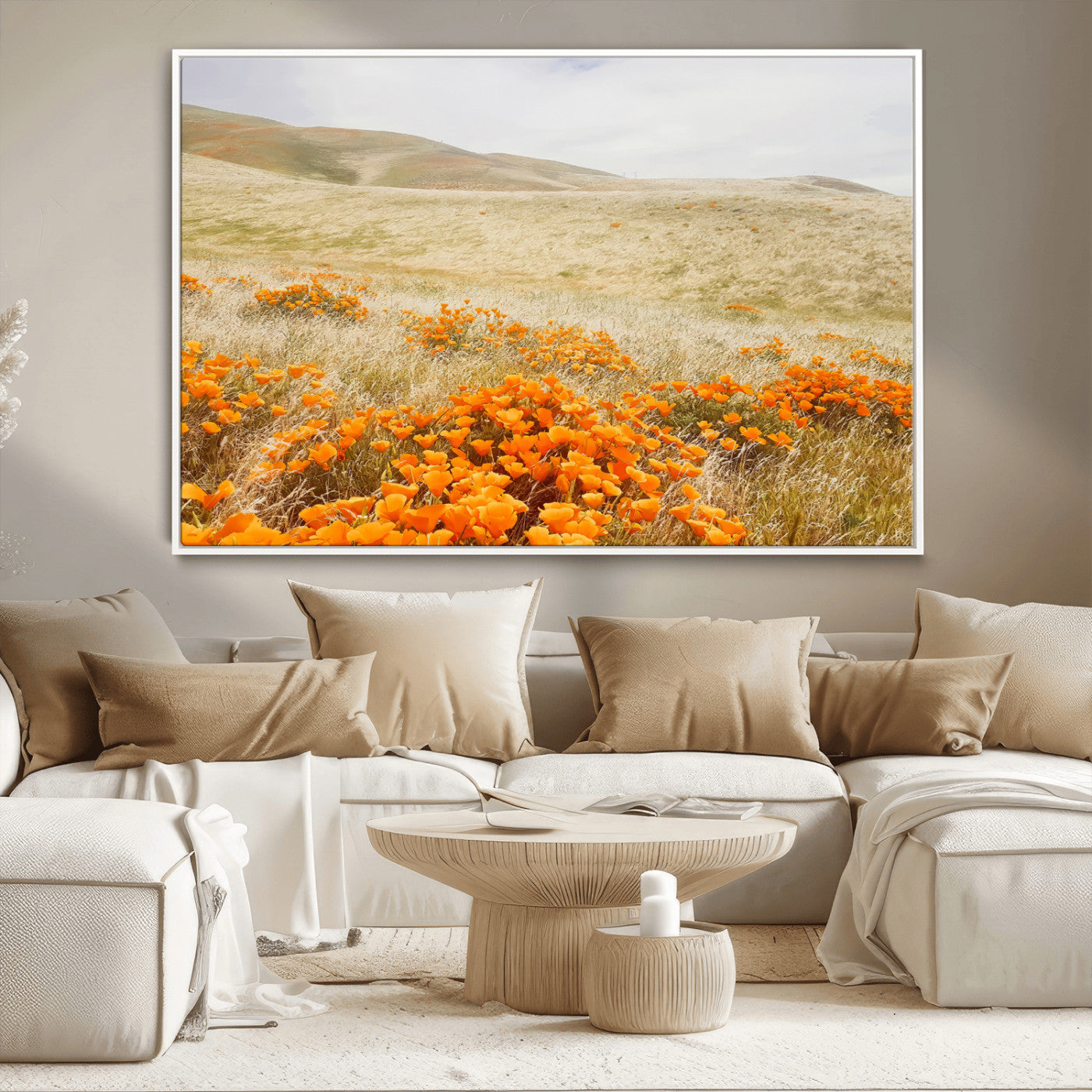 A golden field with vibrant orange poppies blooming across rolling hills under a soft, sunlit sky, creating a warm and rustic landscape.