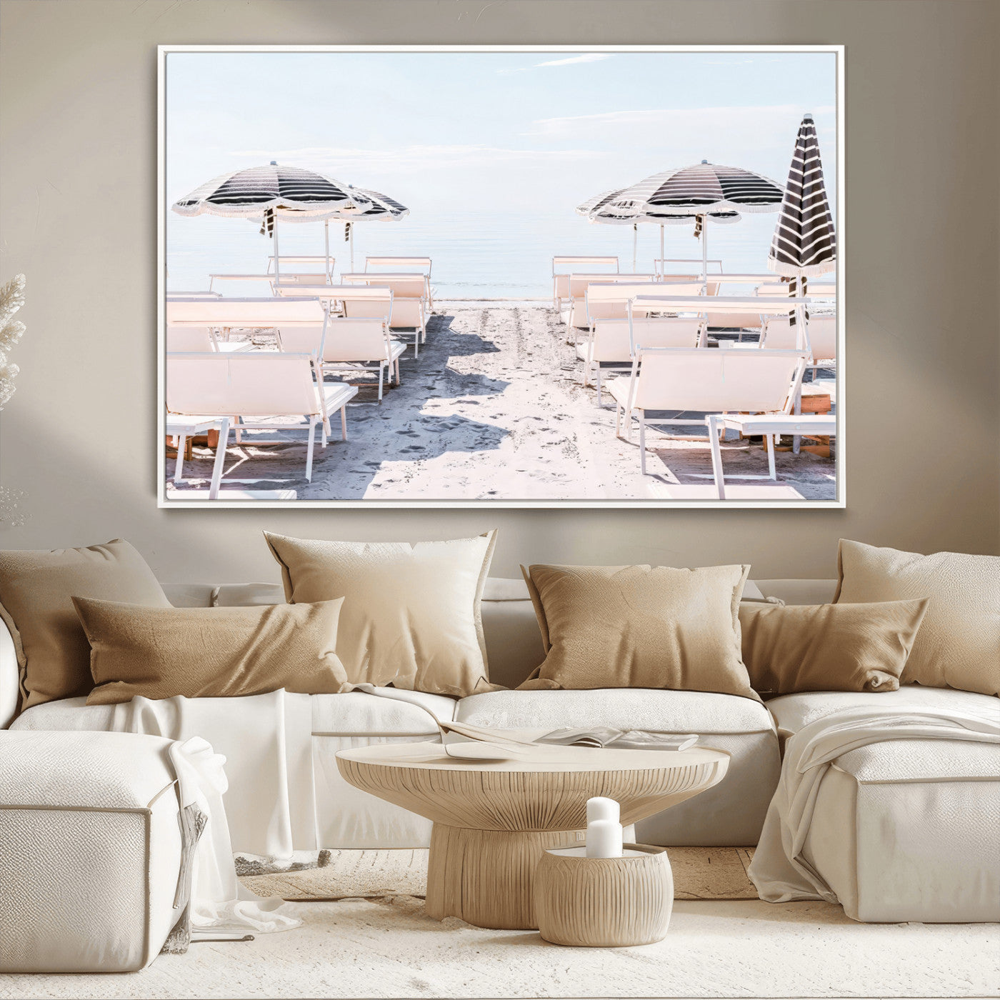 A serene minimalist beach scene featuring striped umbrellas, soft pastel sand, and an elegant lounge setup, creating a tranquil and stylish coastal retreat.