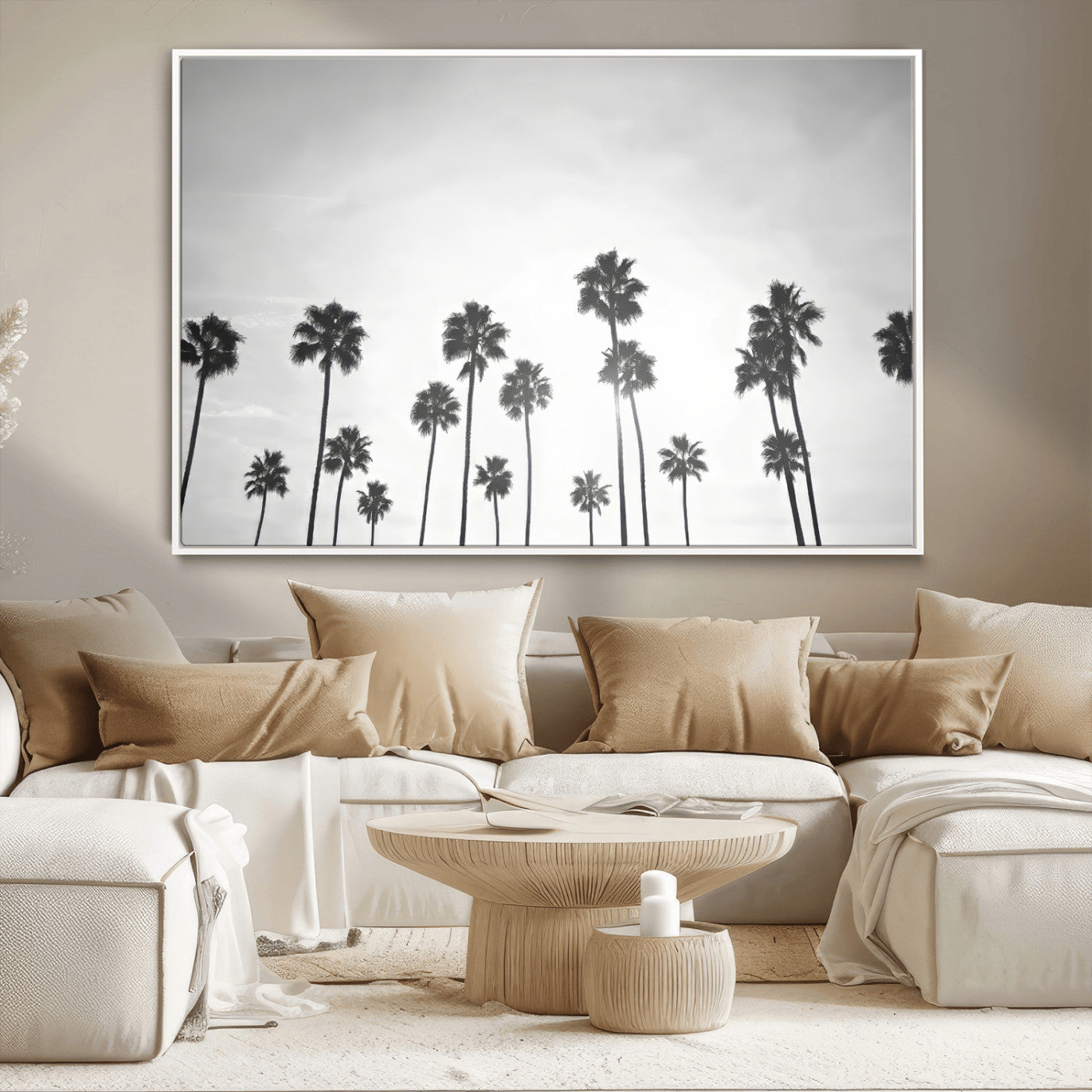 A black and white minimalist scene featuring tall palm trees silhouetted against a bright sky, creating a dreamy and timeless tropical aesthetic.