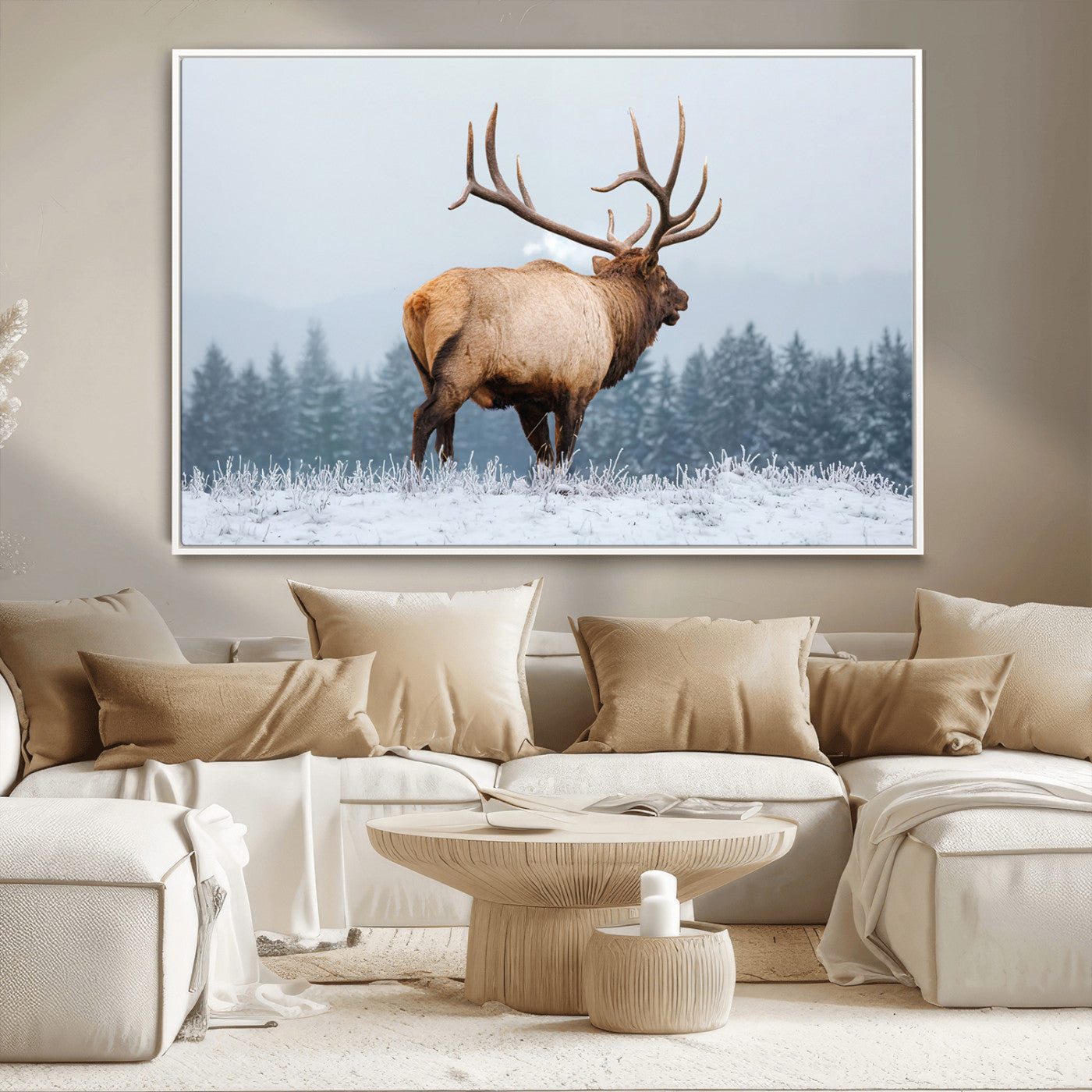 Large elk standing in a snowy field with pine trees in the background, ideal for rustic cabin or lodge-style wall decor.