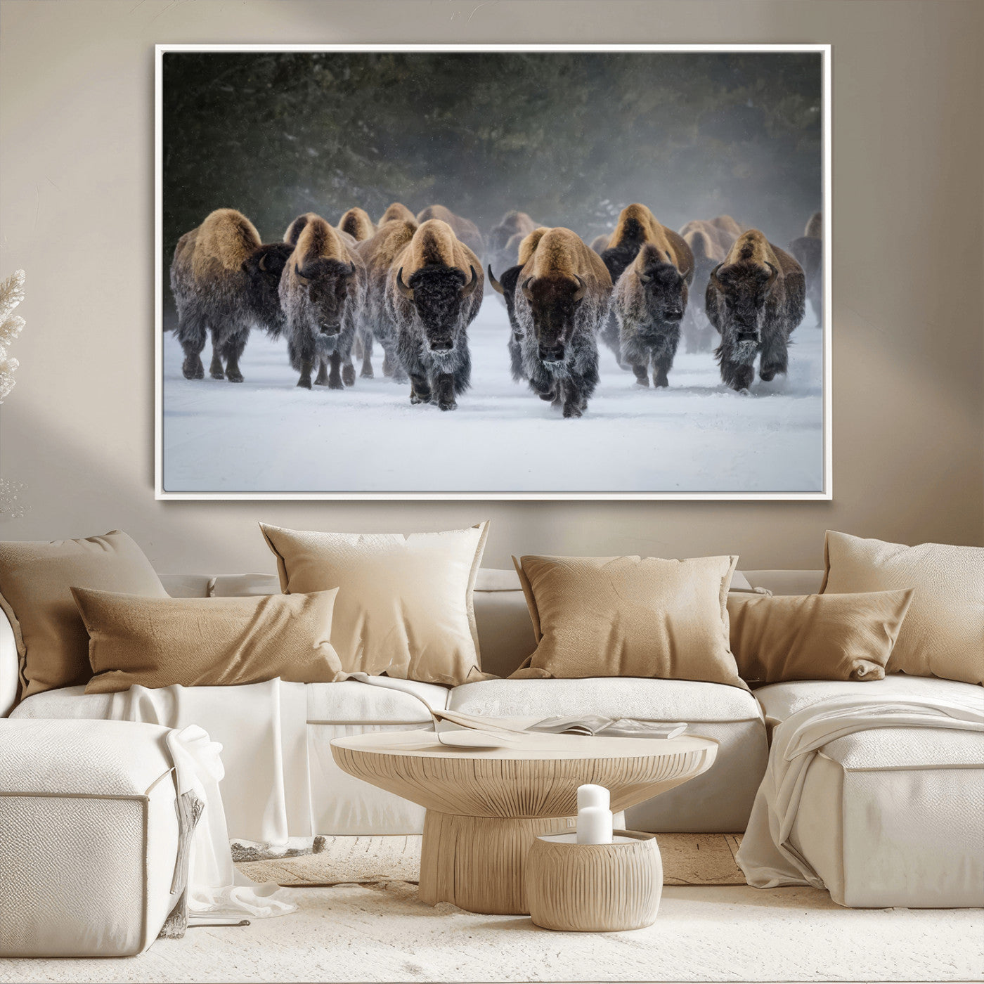 A herd of American bisons walking through deep snow in a forest, evoking a powerful rustic wilderness mood for western-style interiors.