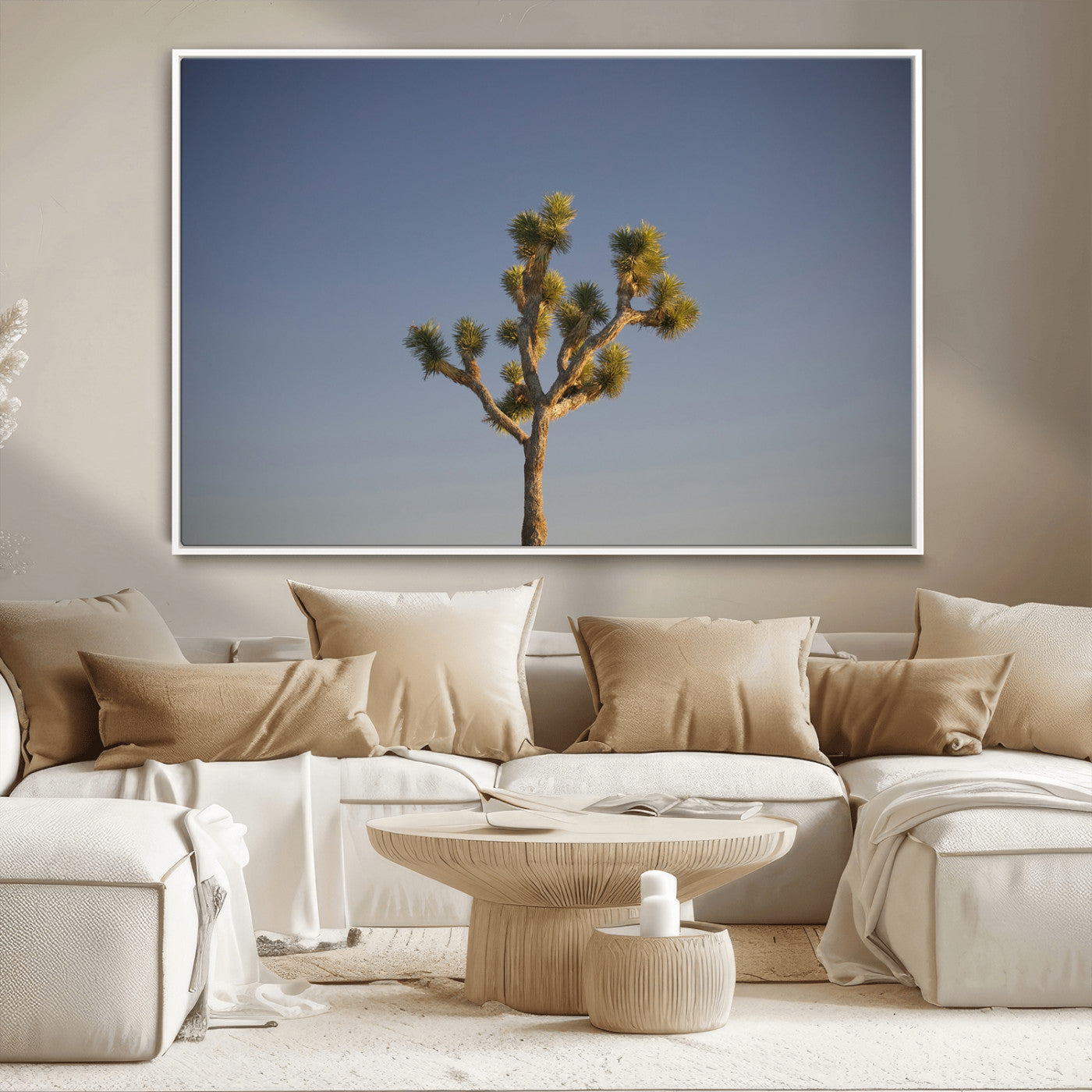 A lone Joshua Tree standing against a deep blue sky, capturing the serene and rugged beauty of the Southwestern desert landscape.