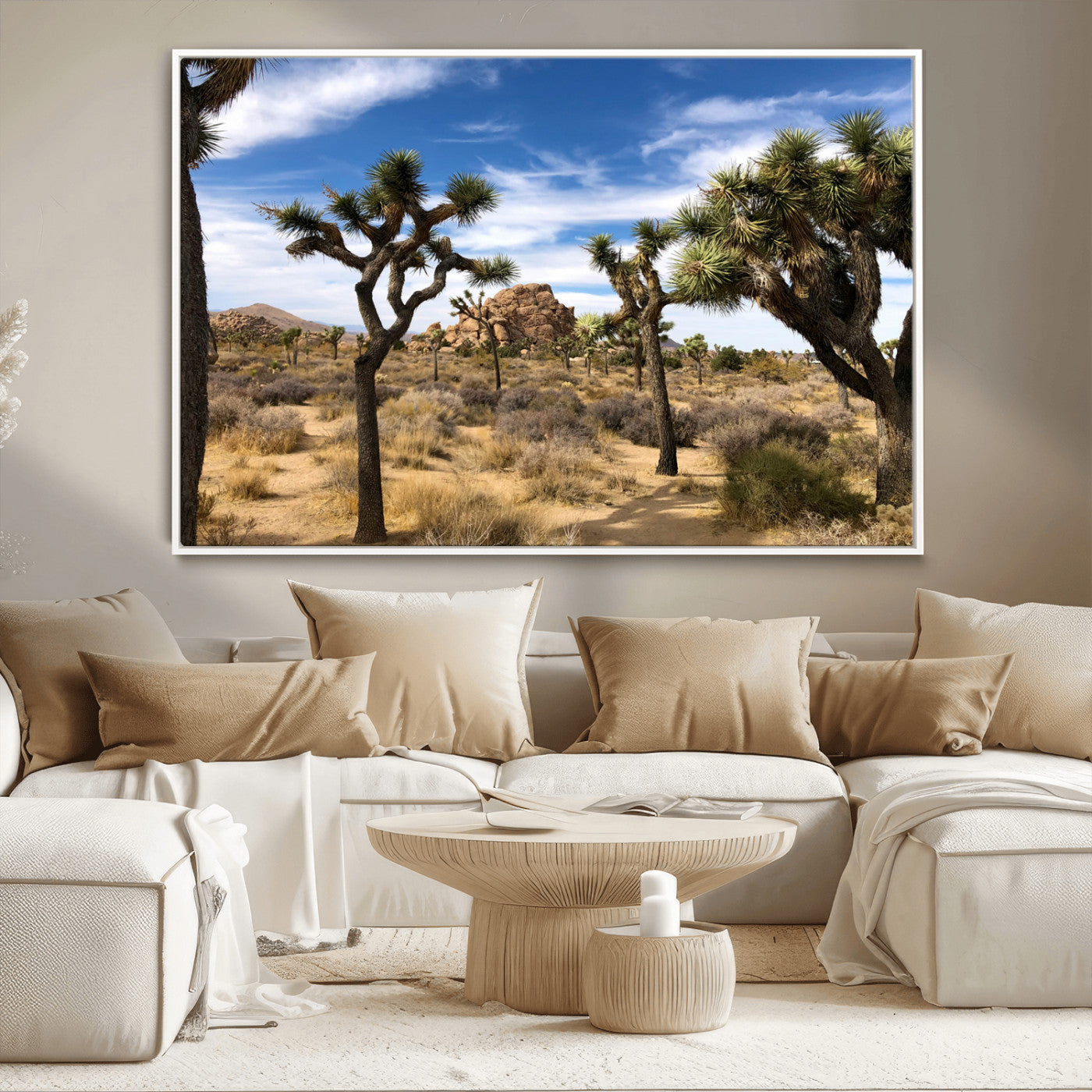 Scenic Joshua Tree landscape with rugged desert terrain, golden dry grass, and a deep blue sky, creating a warm, rustic Southwestern aesthetic.