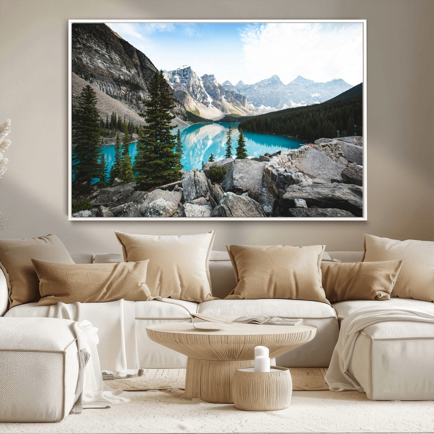 Stunning view of Moraine Lake with turquoise waters reflecting snow-capped mountains and evergreen trees, creating a peaceful alpine decor.