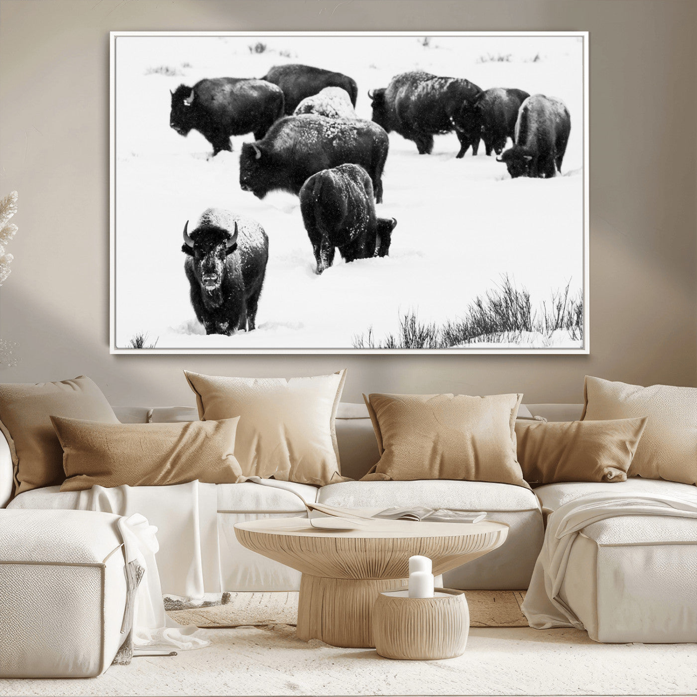 Black and white photograph of a bison herd in a snowy landscape, with snow-covered fur and a rugged wilderness setting, perfect for rustic lodge decor.