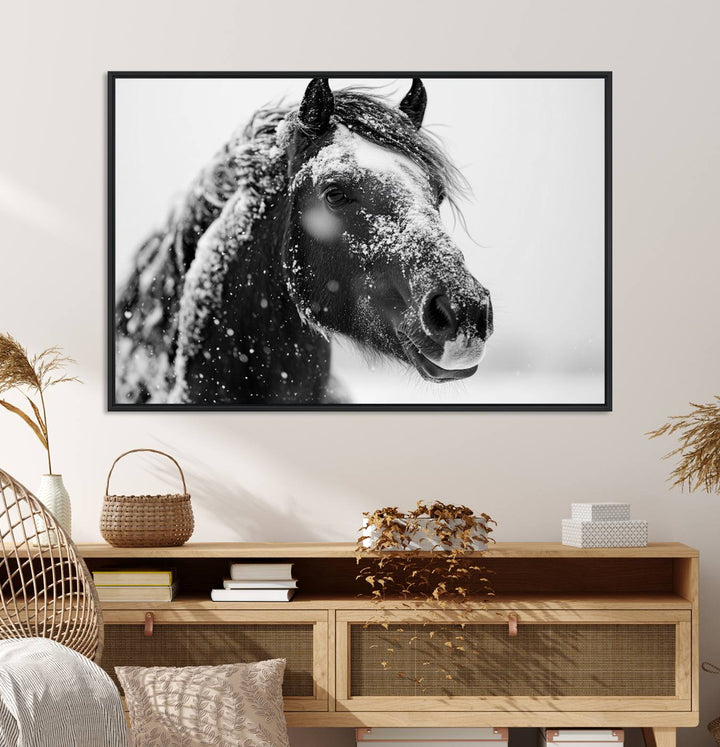 A large 3-panel rustic farmhouse wall art showcases a black and white winter horse canvas print against a snowy backdrop.