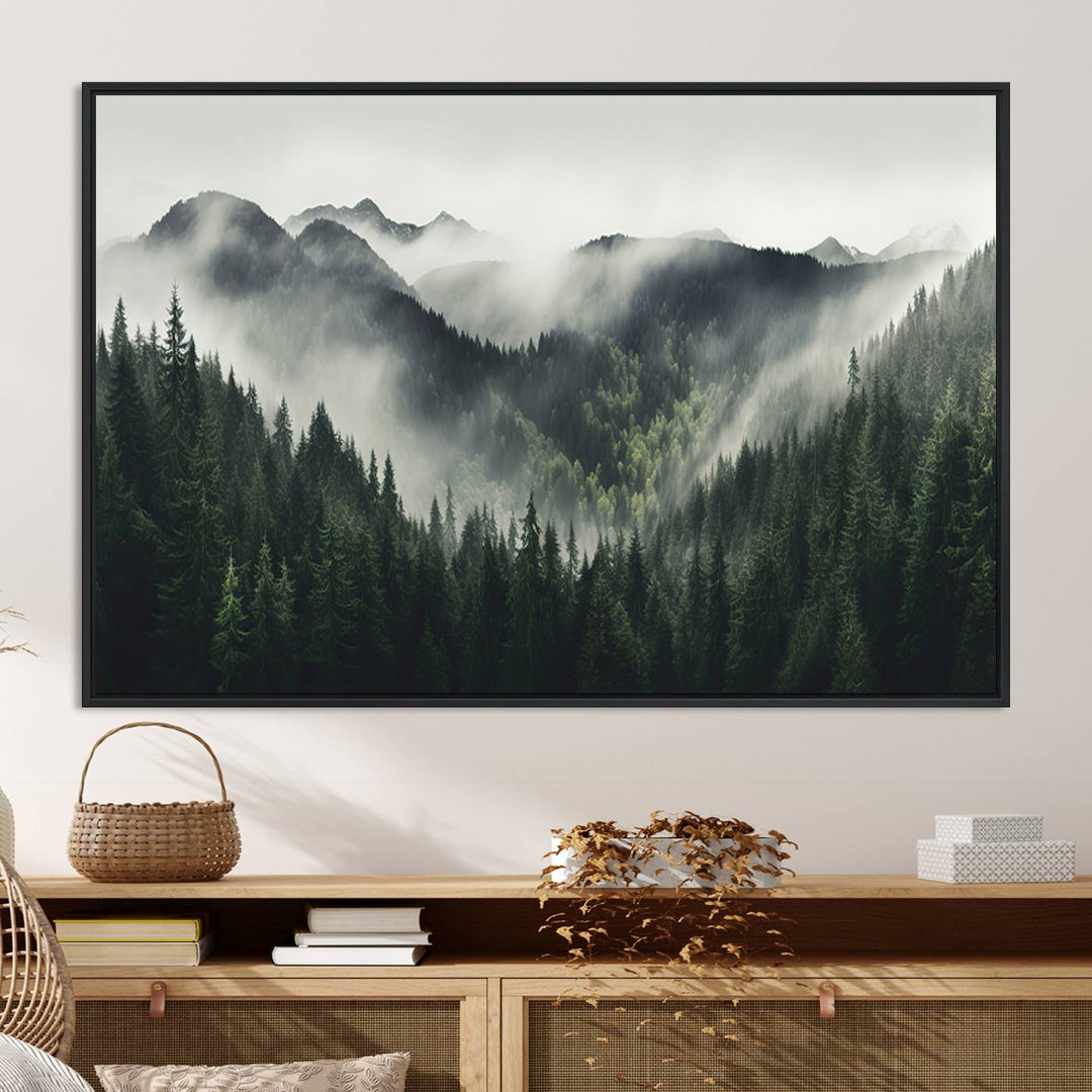 The Misty Forest Canvas Print Wall Art captures a serene misty forest scene with fog and mountains.