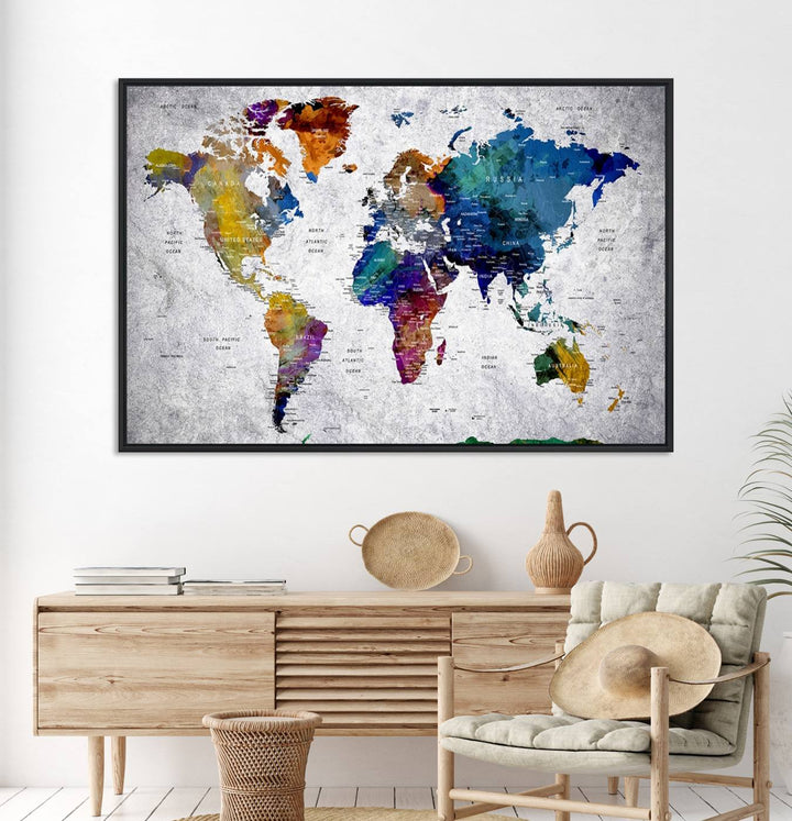 The World Map Art Canvas Print, featuring country names on a grunge-stained gray background, is perfect for stylish home decor.