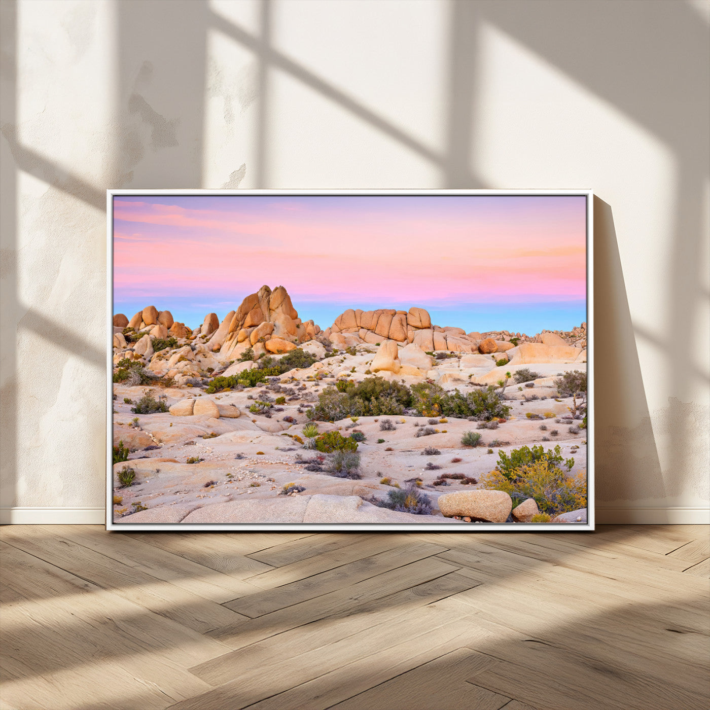 A breathtaking desert landscape featuring rugged rock formations under a vibrant pastel sunset sky, capturing the warmth and serenity of a Southwestern wilderness.