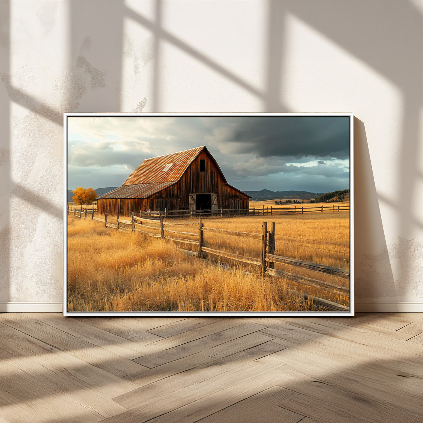 "Golden fields surrounding a rustic barn with a weathered roof, a wooden fence, and dramatic skies with sunlight breaking through the clouds."