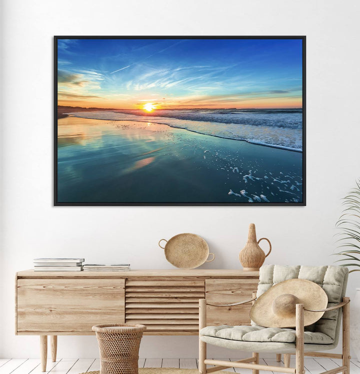 The Blue Sky and Beach Wall Art Canvas Print features a vibrant orange sky reflecting on wet sand.