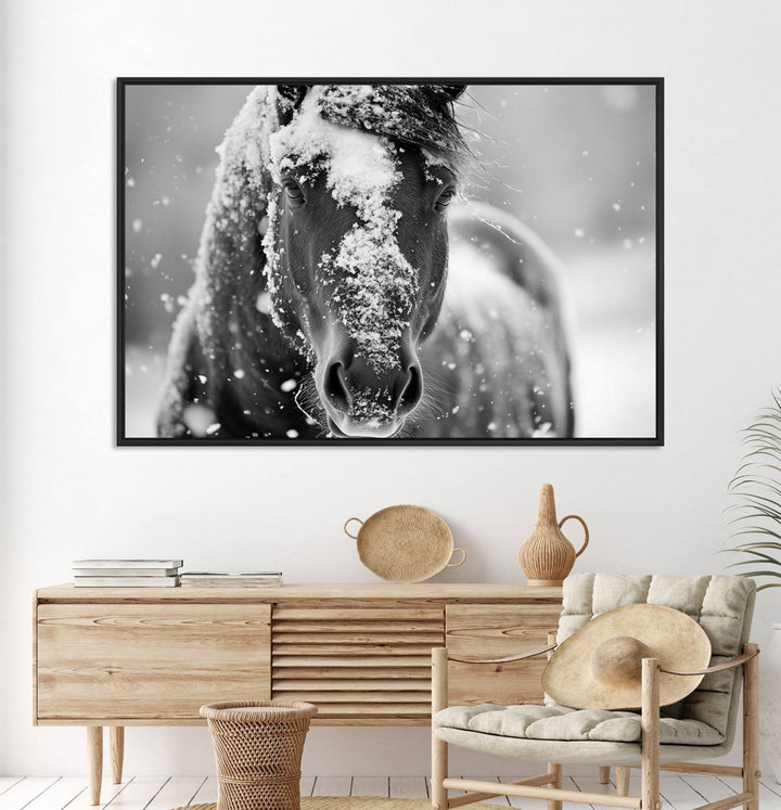 The Black and White Horse Winter Wall Art features a majestic horse with snow-covered hair set against a serene winter backdrop.