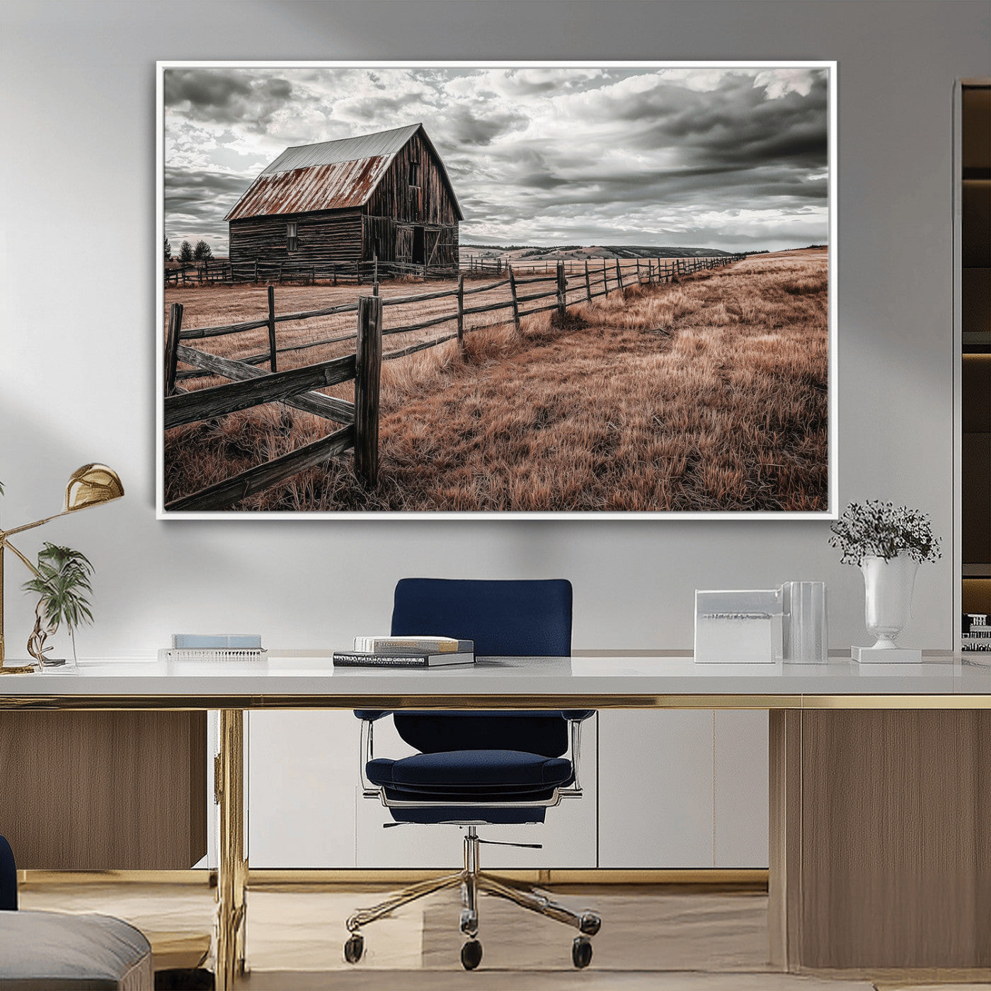 Framed canvas of a rustic barn under a moody sky with weathered fence and dark fields, ideal for farmhouse or rural-style wall decor.