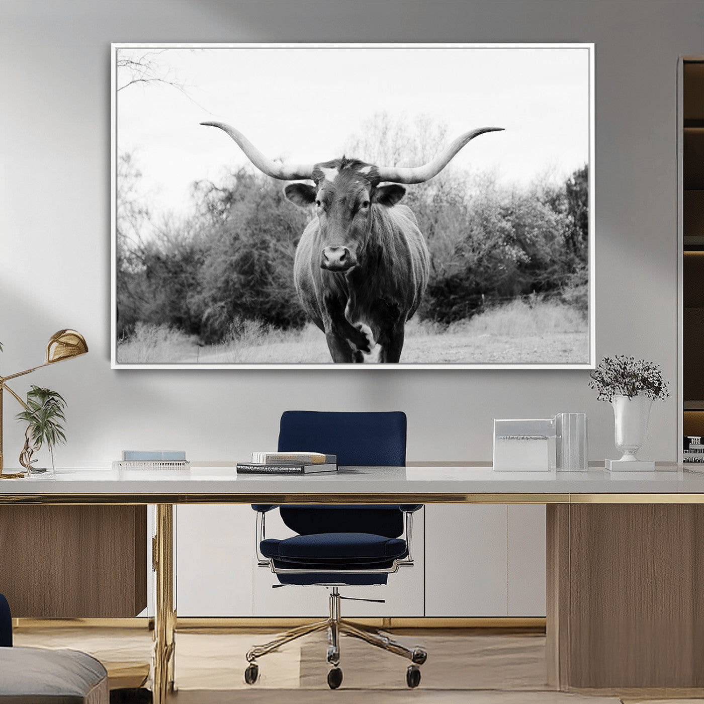Black and white photo of a Longhorn cow facing camera, ideal for rustic, farmhouse, or western-themed home wall decor.