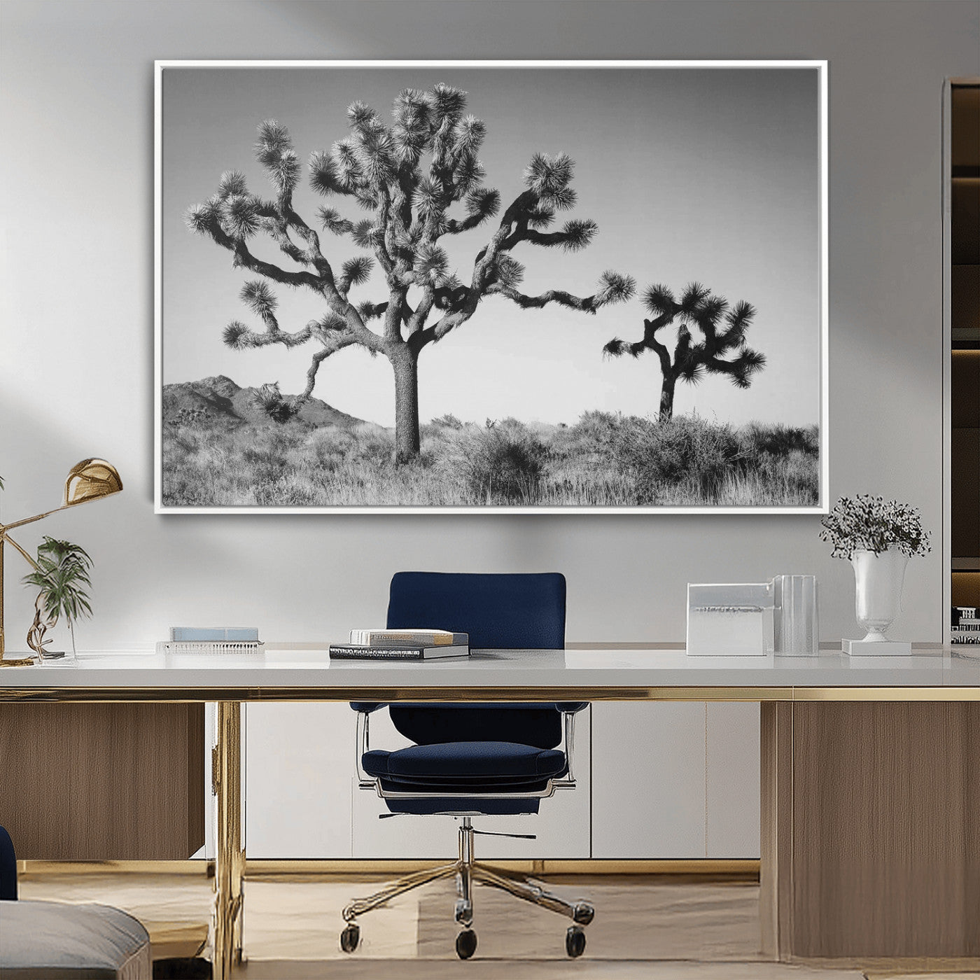 Black and white desert scene with two Joshua trees under clear sky, perfect for rustic or boho-inspired home decor.