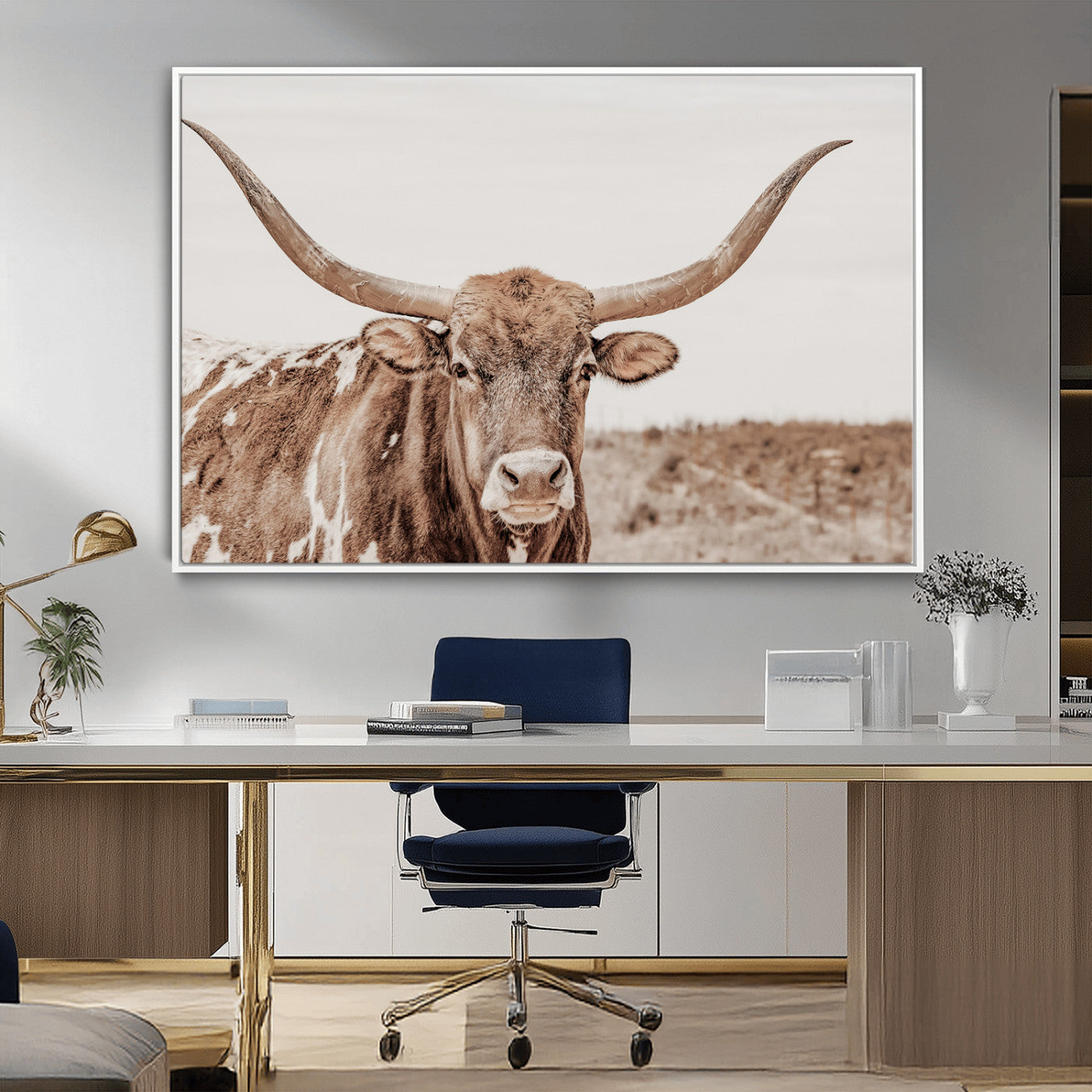 A longhorn cow in soft beige desert tones, standing calmly in open land, perfect for neutral western or rustic farmhouse interiors.
