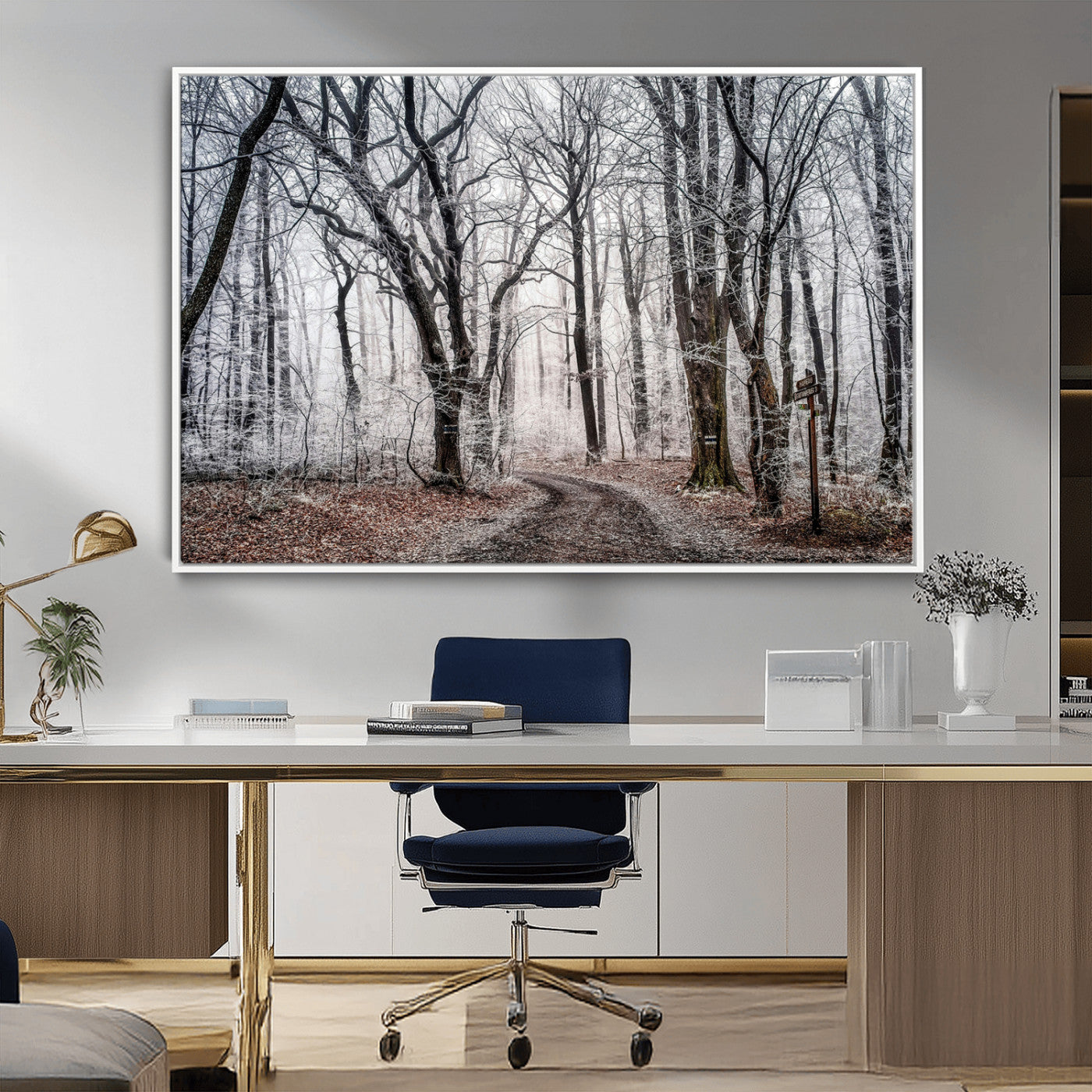 Snow-covered trees in a misty winter forest with a winding path, creating a serene and mysterious atmosphere, perfect for nature-inspired wall art.