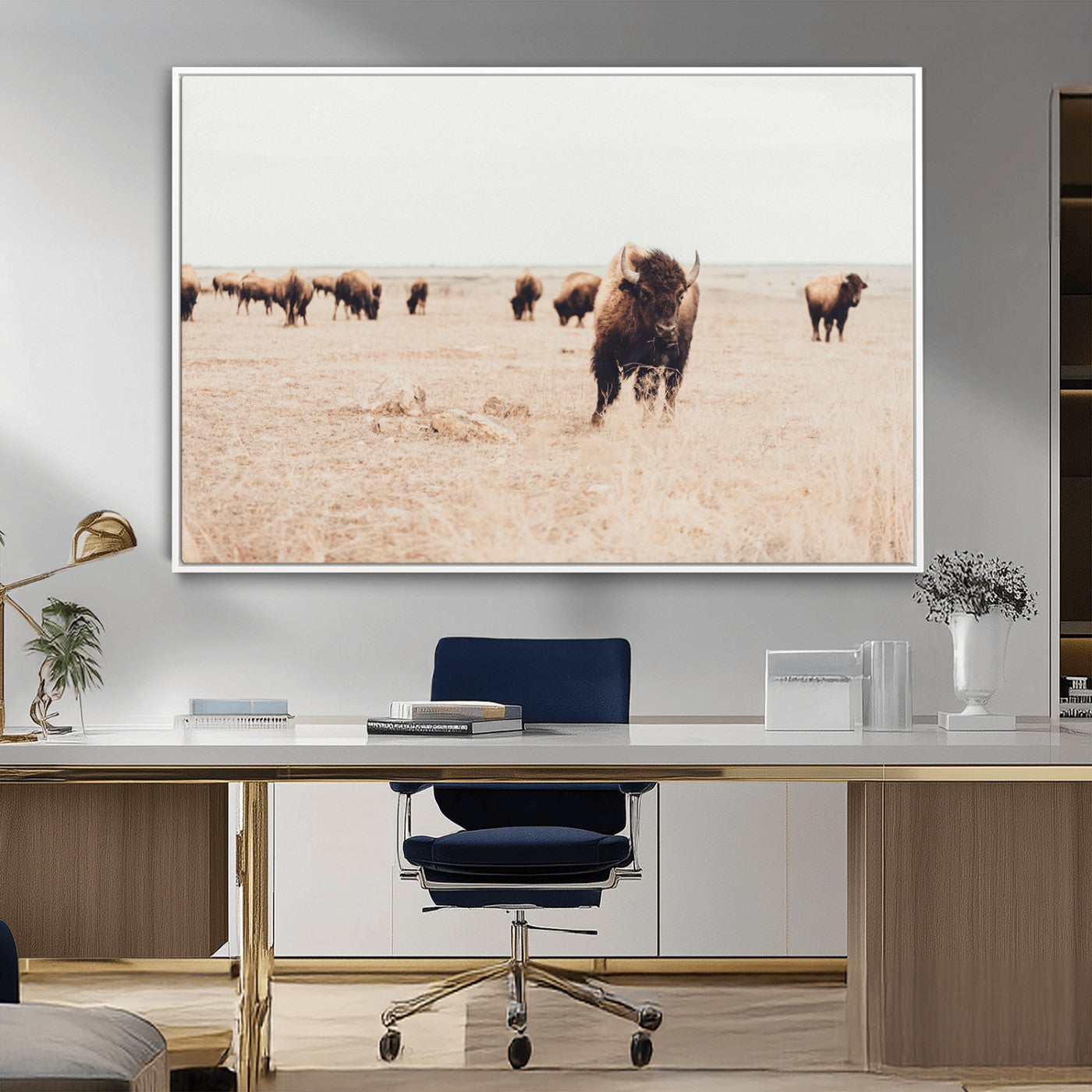 Herd of bison roaming a vast prairie with golden grass under a soft sky, creating a rustic and Western landscape, ideal for wall art.