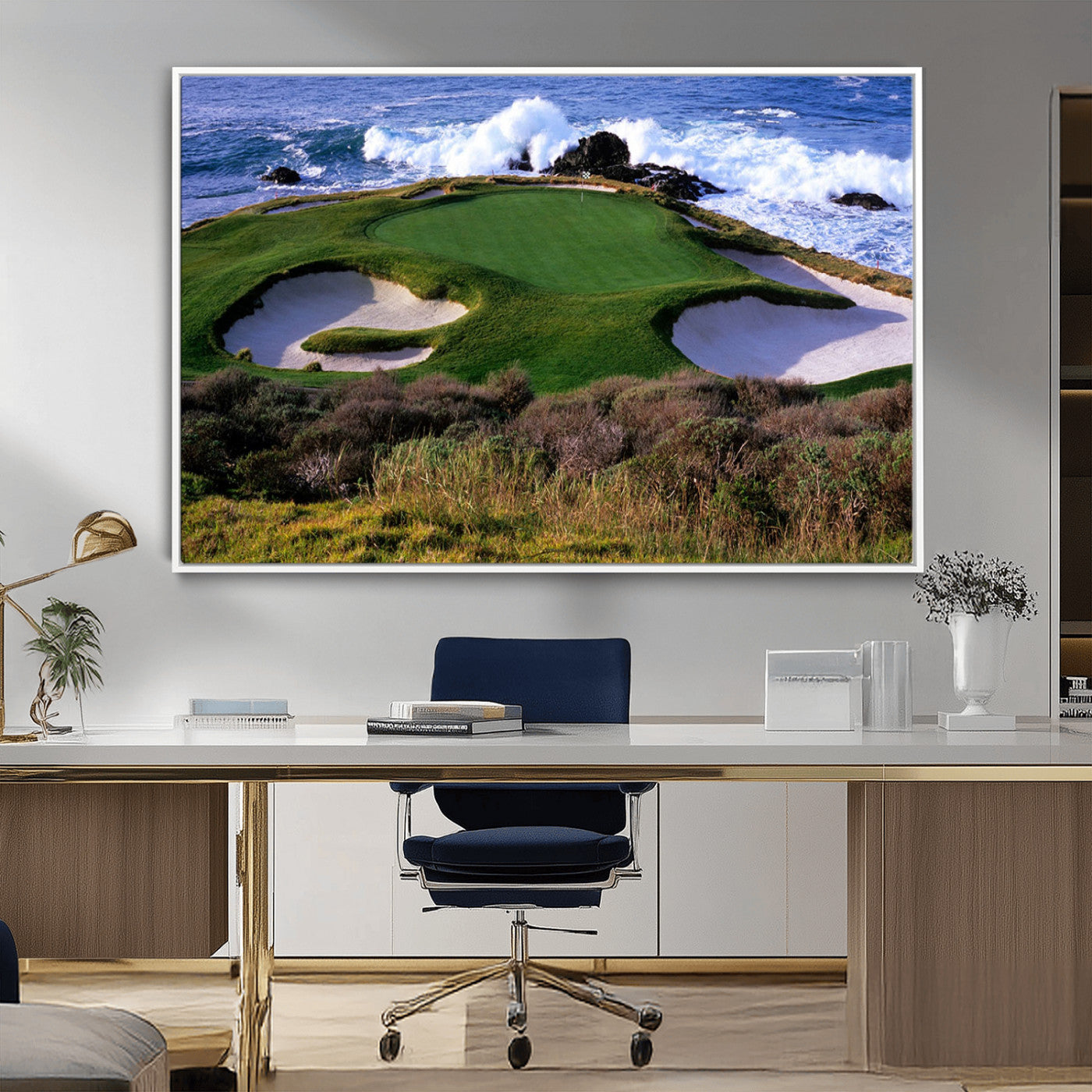 A scenic golf course located by the ocean, featuring a well-manicured green surrounded by sand traps and powerful ocean waves crashing on the shore.