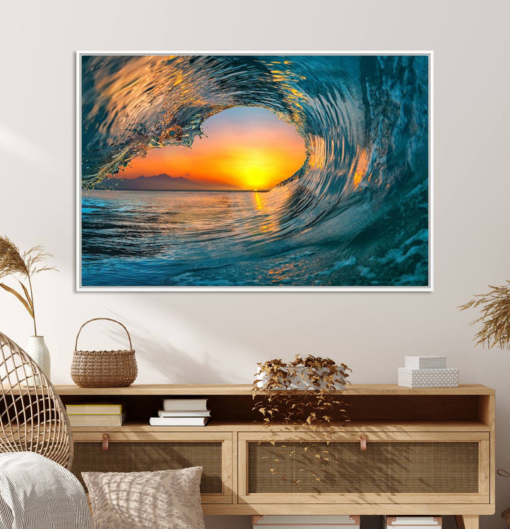 The Ocean Wave Sunset Wall Art canvas print features a vibrant ocean wave at sunset, forming a tunnel with silhouetted mountains.