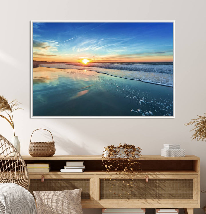 The Blue Sky and Beach Wall Art Canvas Print features a vibrant orange sky reflecting on wet sand.