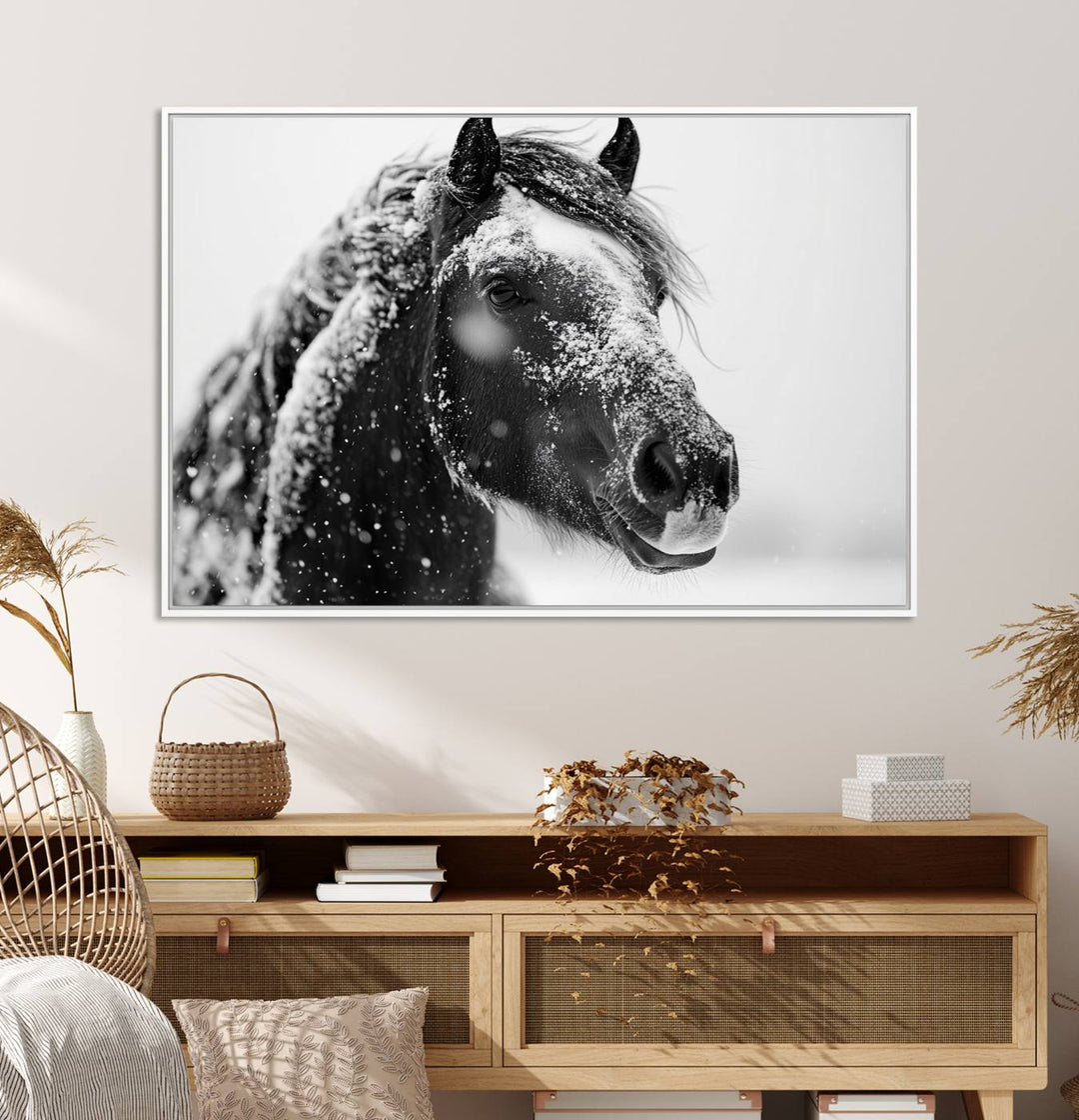 A large 3-panel rustic farmhouse wall art showcases a black and white winter horse canvas print against a snowy backdrop.