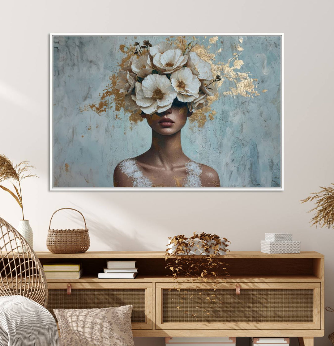 Golden Petal Wall Art: A womans face adorned with a gold floral design on a teal background, presented in a 3-panel modern glam canvas.