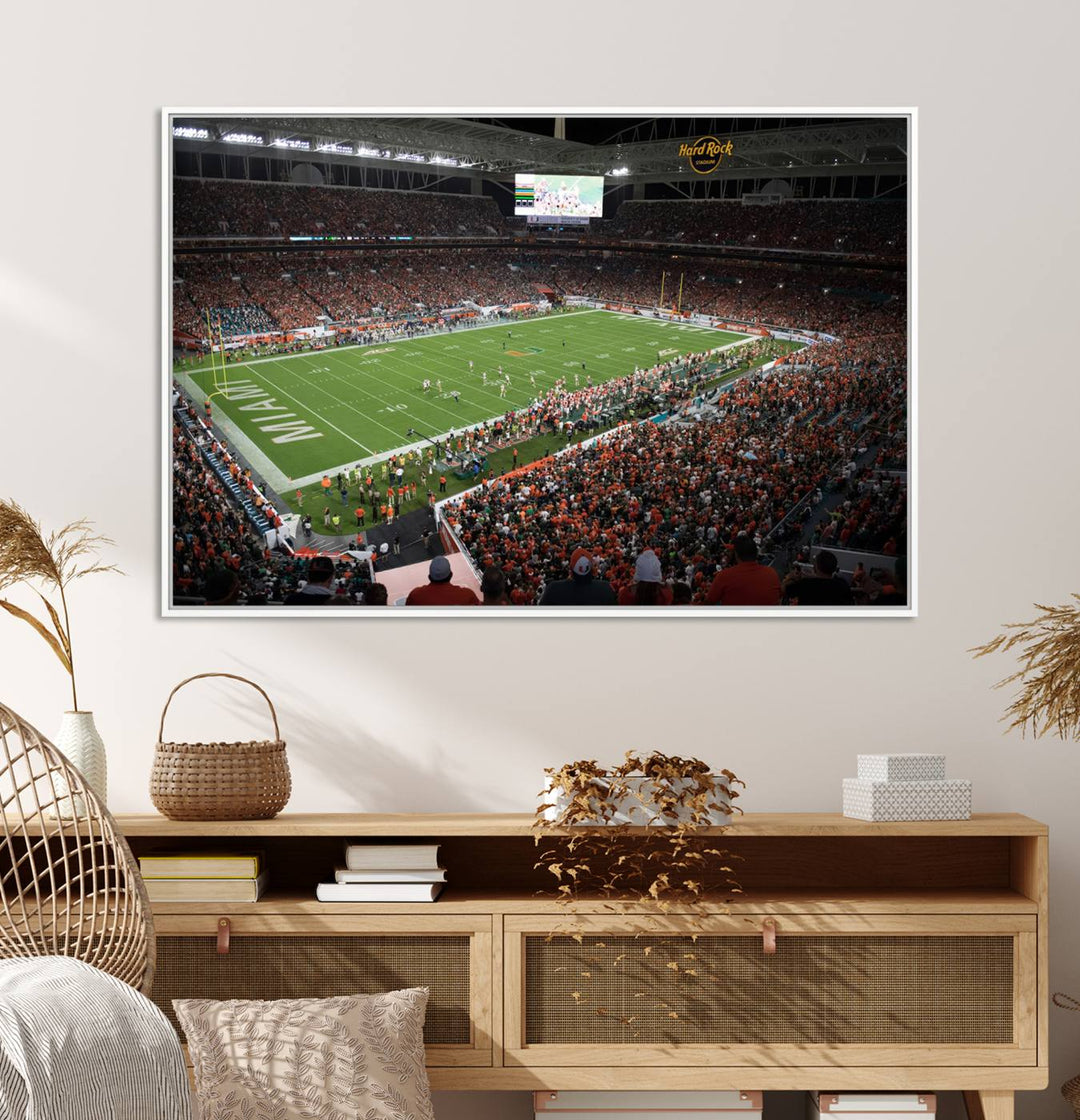 Aerial view of a Miami Hurricanes game at Hard Rock Stadium captured on canvas print, showcasing the teams on the field and fans in the stands.