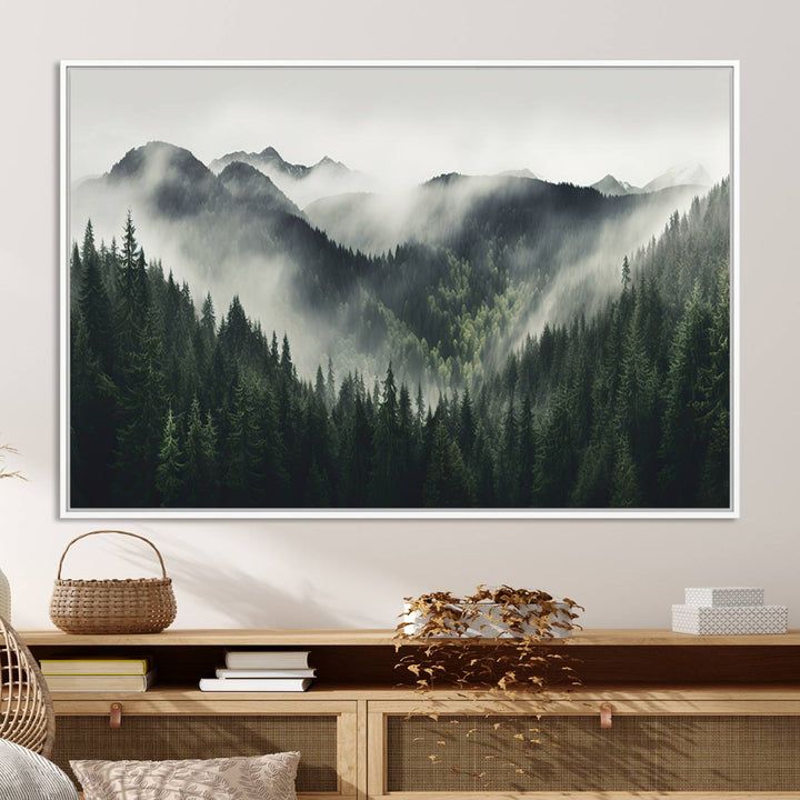 The Misty Forest Canvas Print Wall Art captures a serene misty forest scene with fog and mountains.