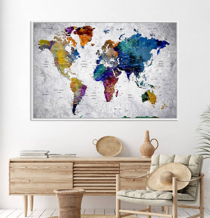 The World Map Art Canvas Print, featuring country names on a grunge-stained gray background, is perfect for stylish home decor.